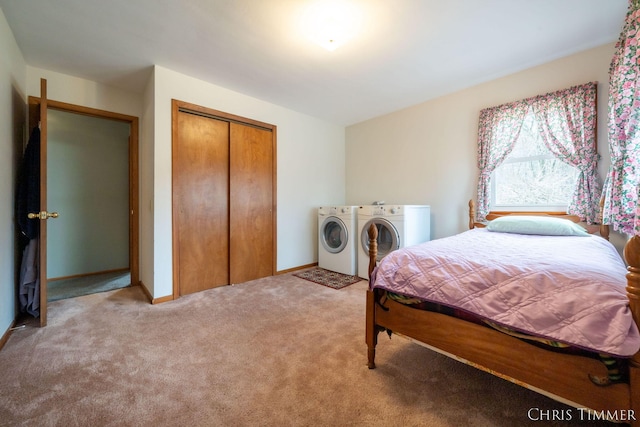 15230 Van Buren St Unit B, Holland, MI 49424 - bedroom with washing machine and dryer, baseboards, carpet floors, and a closet