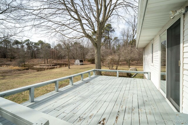 15230 Van Buren St Unit B, Holland, MI 49424 - wooden deck featuring an outbuilding, a yard, and a storage shed