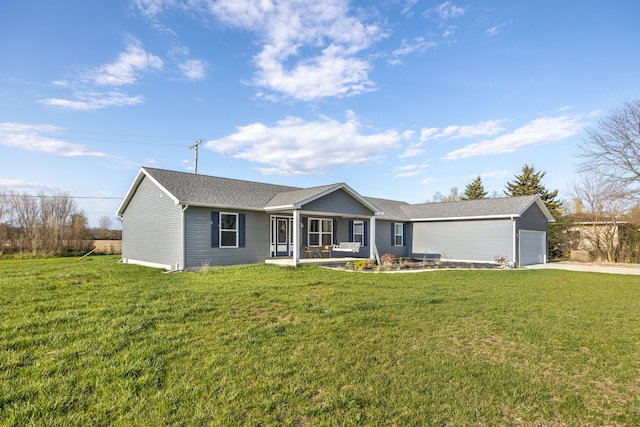 48320 Martz Rd, Van Buren Twp, MI 48111 - view of front facade with a shingled roof, concrete driveway, a front yard, and a garage