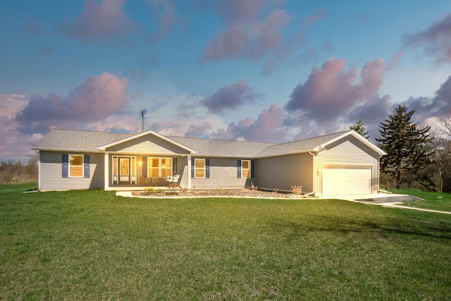 48320 Martz Rd, Van Buren Twp, MI 48111 - ranch-style home with an attached garage, covered porch, a front yard, and concrete driveway