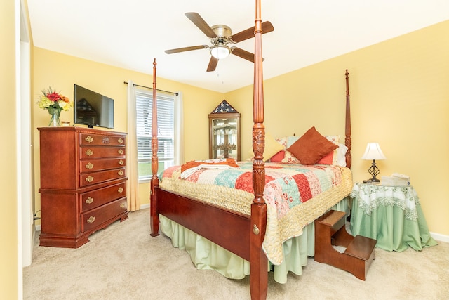 48320 Martz Rd, Van Buren Twp, MI 48111 - carpeted bedroom with a ceiling fan and baseboards