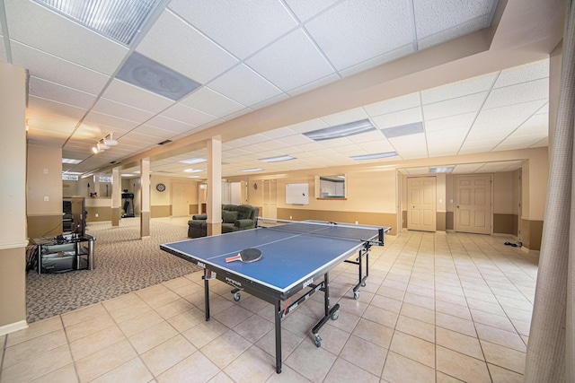 2925 Exmoor Rd, Ann Arbor, MI 48104 - game room with light tile patterned flooring, a drop ceiling, and baseboards