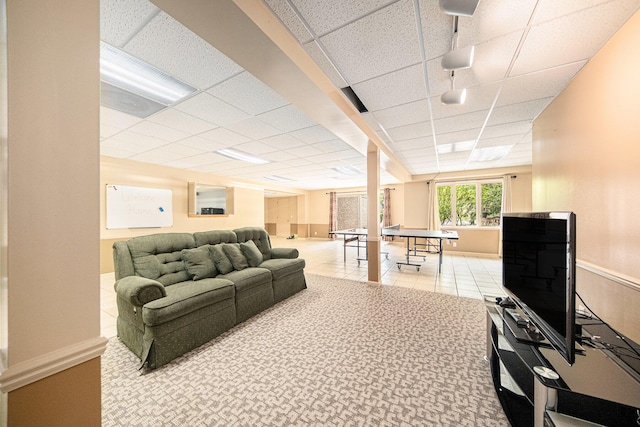 2925 Exmoor Rd, Ann Arbor, MI 48104 - living room featuring a drop ceiling and baseboards