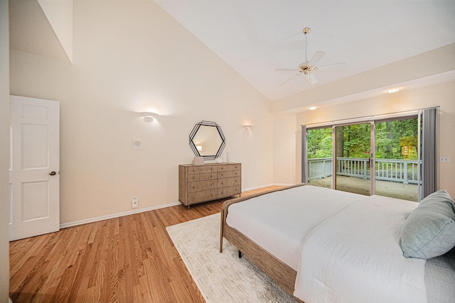 2925 Exmoor Rd, Ann Arbor, MI 48104 - bedroom featuring access to exterior, light wood finished floors, high vaulted ceiling, baseboards, and ceiling fan