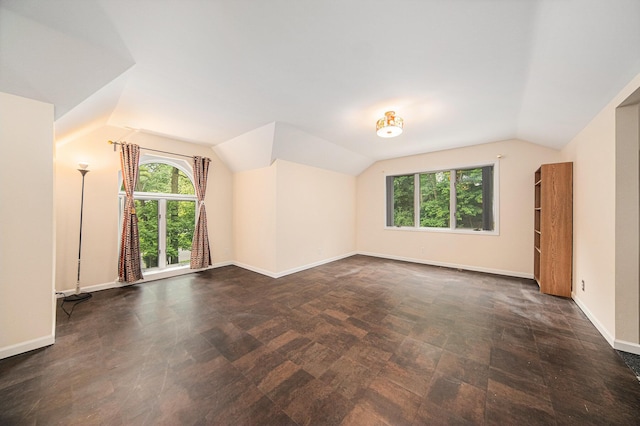 2925 Exmoor Rd, Ann Arbor, MI 48104 - additional living space featuring lofted ceiling, plenty of natural light, and baseboards