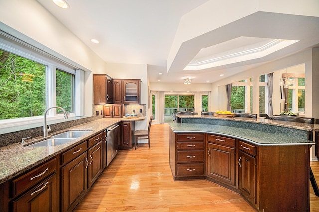 2925 Exmoor Rd, Ann Arbor, MI 48104 - kitchen with a sink, light wood-style floors, dishwasher, healthy amount of natural light, and recessed lighting
