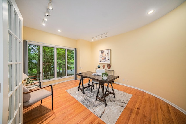 2925 Exmoor Rd, Ann Arbor, MI 48104 - office area featuring rail lighting, wood finished floors, baseboards, and recessed lighting