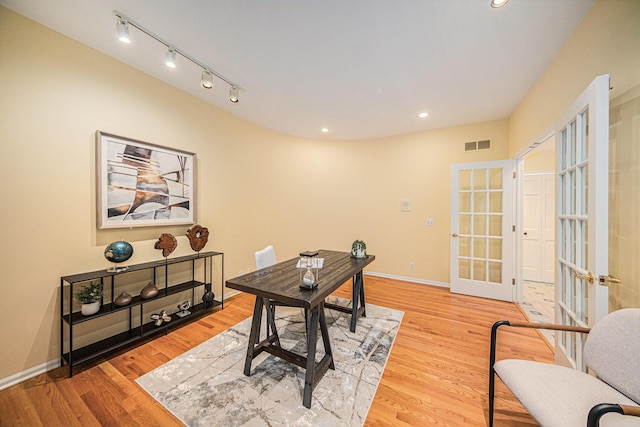 2925 Exmoor Rd, Ann Arbor, MI 48104 - home office with french doors, light wood finished floors, recessed lighting, baseboards, and rail lighting