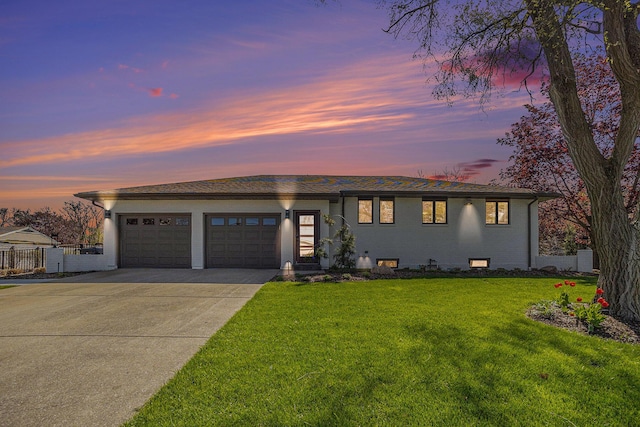 55 Gabriel Dr, South Haven, MI 49090 - view of front of house with concrete driveway and an attached garage