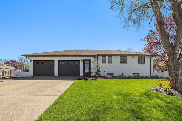 55 Gabriel Dr, South Haven, MI 49090 - view of front of property with concrete driveway, an attached garage, and brick siding