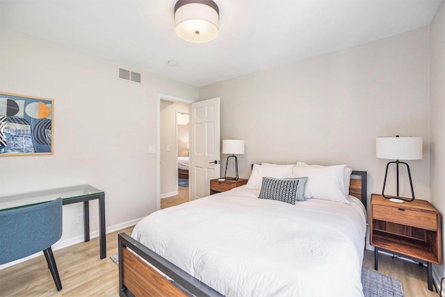 55 Gabriel Dr, South Haven, MI 49090 - bedroom with light wood-style floors and baseboards