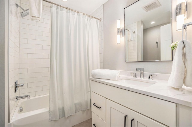 55 Gabriel Dr, South Haven, MI 49090 - bathroom featuring shower / tub combo with curtain, vanity, and recessed lighting