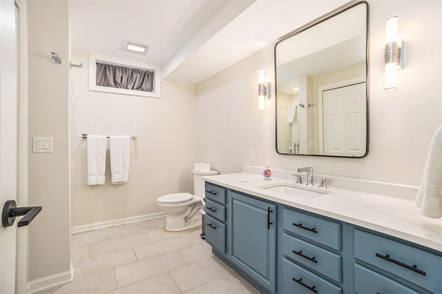 55 Gabriel Dr, South Haven, MI 49090 - bathroom featuring baseboards, tile patterned flooring, toilet, and vanity