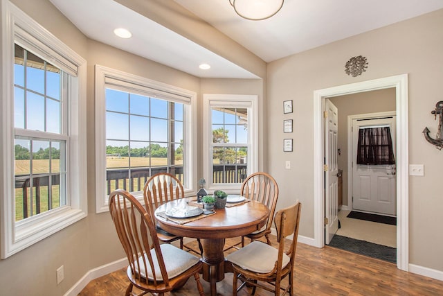 672 66th St, South Haven, MI 49090 - dining room featuring healthy amount of natural light, dark wood-type flooring, and recessed lighting