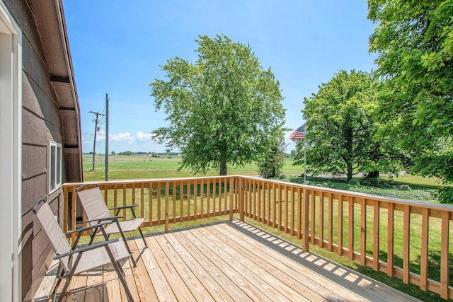 672 66th St, South Haven, MI 49090 - wooden deck featuring a yard