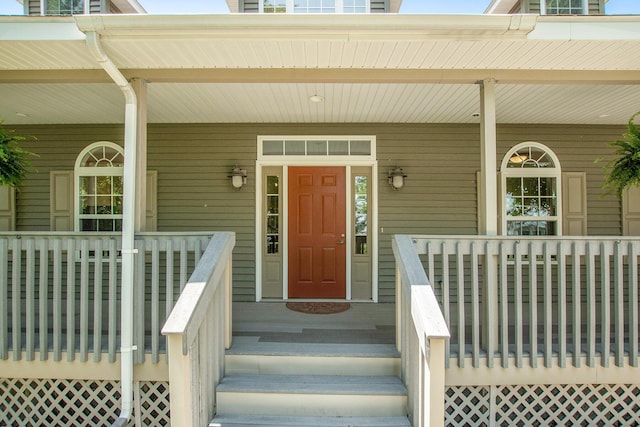 672 66th St, South Haven, MI 49090 - doorway to property featuring covered porch