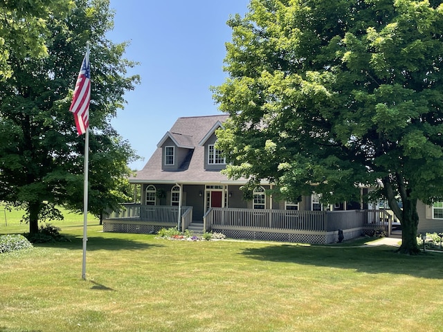 672 66th St, South Haven, MI 49090 - view of front of house featuring a front lawn and a porch