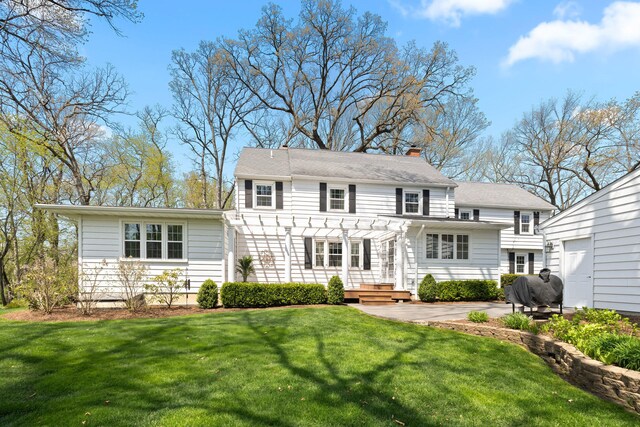 328 E 650 S, La Porte, IN 46350 - back of property featuring a lawn, a pergola, heating fuel, and a patio area