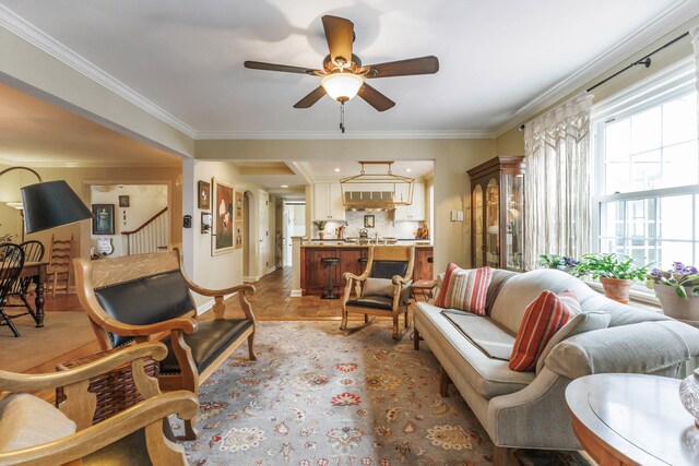 328 E 650 S, La Porte, IN 46350 - living area with baseboards, ornamental molding, ceiling fan, and stairway