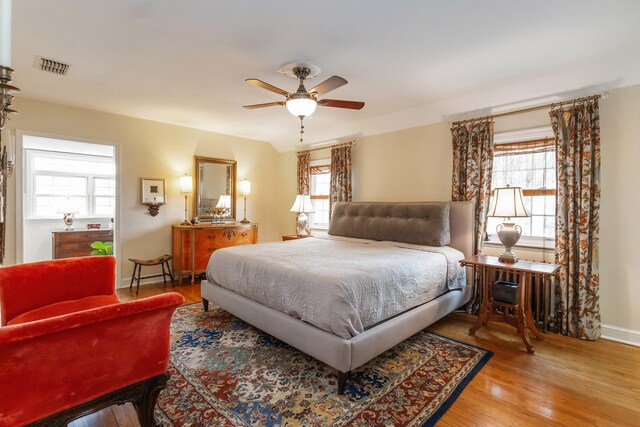 328 E 650 S, La Porte, IN 46350 - bedroom with visible vents, a ceiling fan, baseboards, and wood finished floors