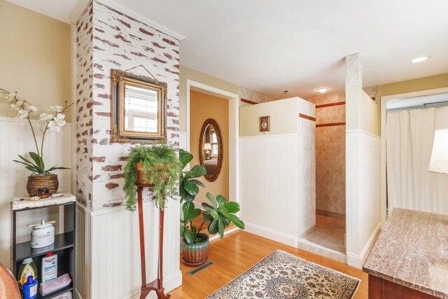 328 E 650 S, La Porte, IN 46350 - corridor with baseboards, wainscoting, and wood finished floors