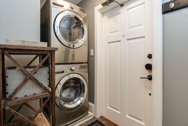 22 Jefferson Ave SE, Grand Rapids, MI 49503 - washroom featuring stacked washing machine and dryer