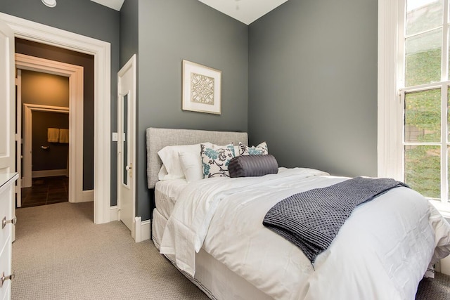 22 Jefferson Ave SE, Grand Rapids, MI 49503 - bedroom featuring light colored carpet and baseboards
