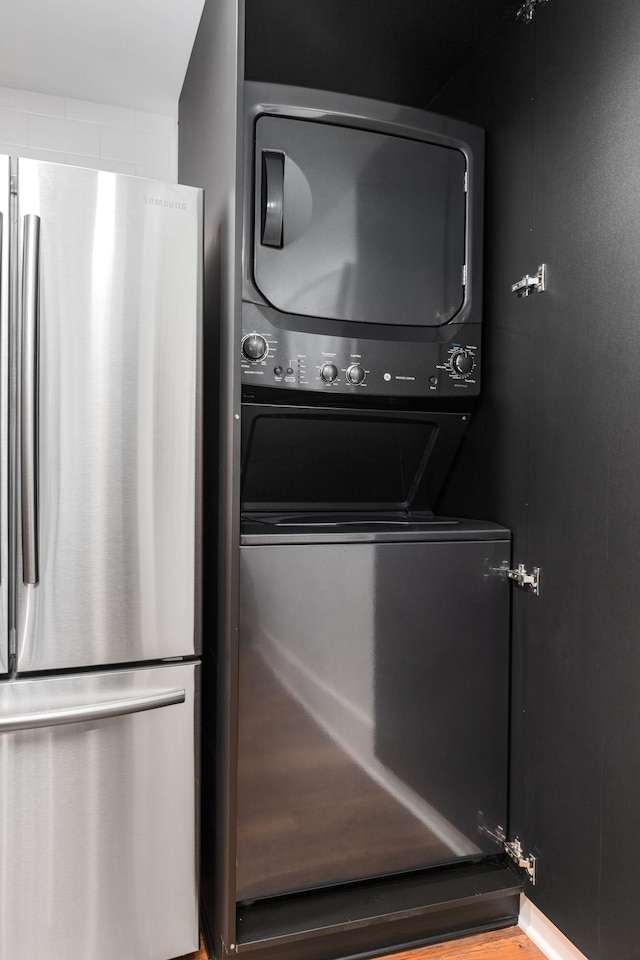 22 Jefferson Ave SE, Grand Rapids, MI 49503 - washroom with stacked washer and clothes dryer