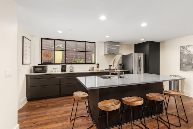 22 Jefferson Ave SE, Grand Rapids, MI 49503 - kitchen with freestanding refrigerator, modern cabinets, baseboards, black microwave, and dark wood-style floors