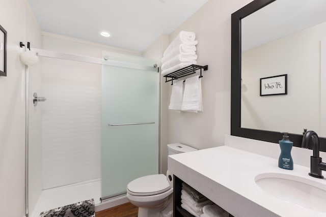 22 Jefferson Ave SE, Grand Rapids, MI 49503 - bathroom featuring a shower stall, vanity, toilet, recessed lighting, and wood finished floors
