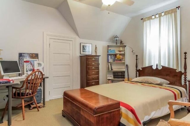 22 Jefferson Ave SE, Grand Rapids, MI 49503 - bedroom with vaulted ceiling, light carpet, a desk, and a ceiling fan