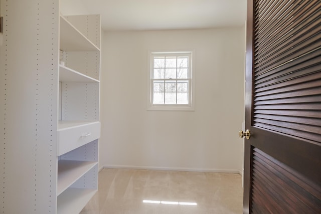16230 Woodcrest Dr, Spring Lake, MI 49456 - walk in closet featuring carpet