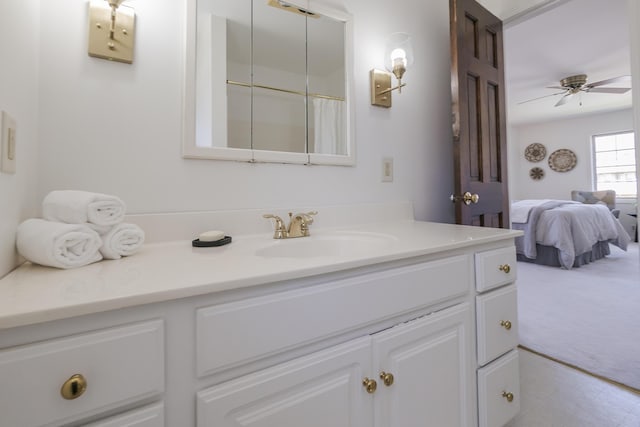 16230 Woodcrest Dr, Spring Lake, MI 49456 - bathroom with ensuite bath, a ceiling fan, and vanity