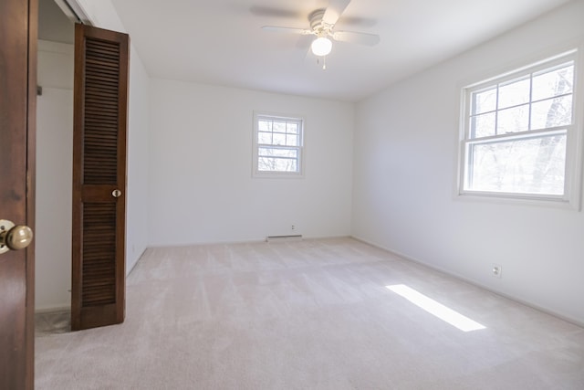 16230 Woodcrest Dr, Spring Lake, MI 49456 - unfurnished bedroom featuring carpet and ceiling fan