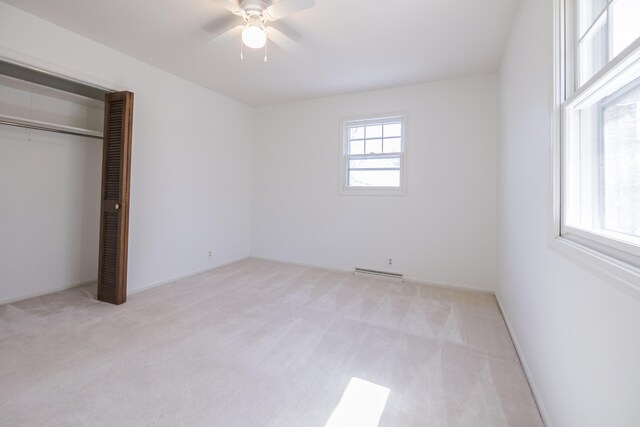 16230 Woodcrest Dr, Spring Lake, MI 49456 - unfurnished bedroom featuring a ceiling fan, carpet, and a closet