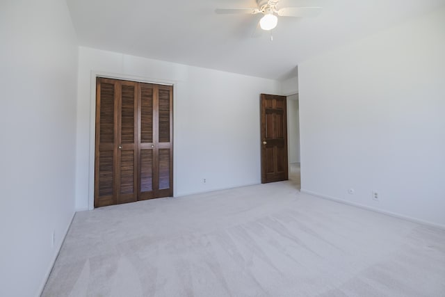 16230 Woodcrest Dr, Spring Lake, MI 49456 - unfurnished bedroom featuring baseboards, a ceiling fan, carpet flooring, and a closet