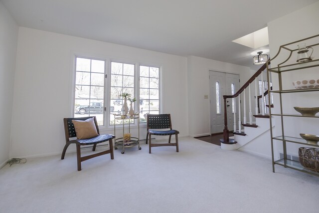 16230 Woodcrest Dr, Spring Lake, MI 49456 - sitting room with baseboards, carpet floors, and stairs
