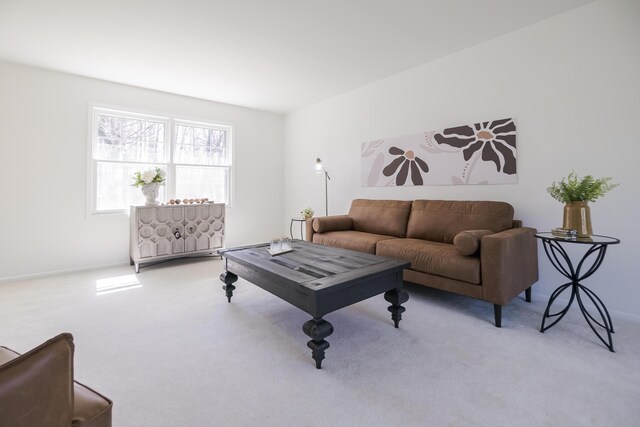 16230 Woodcrest Dr, Spring Lake, MI 49456 - carpeted living area featuring baseboards