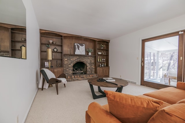16230 Woodcrest Dr, Spring Lake, MI 49456 - living area with a baseboard radiator, light carpet, built in features, baseboards, and a brick fireplace