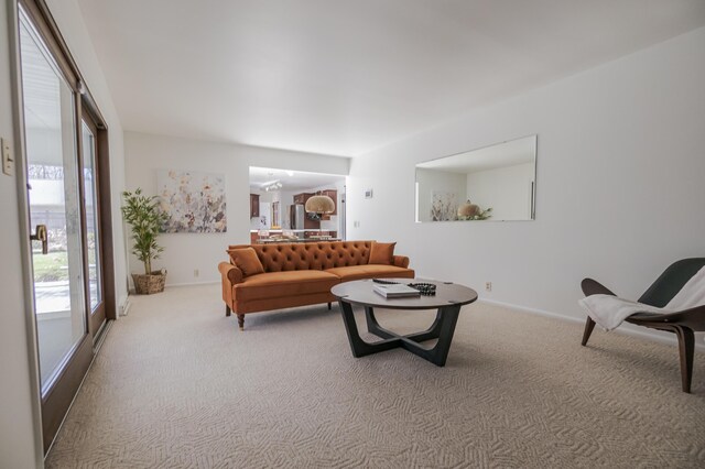 16230 Woodcrest Dr, Spring Lake, MI 49456 - carpeted living area with baseboards