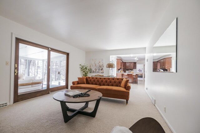 16230 Woodcrest Dr, Spring Lake, MI 49456 - living room with light colored carpet and baseboards