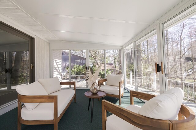 16230 Woodcrest Dr, Spring Lake, MI 49456 - sunroom / solarium featuring lofted ceiling and carpet