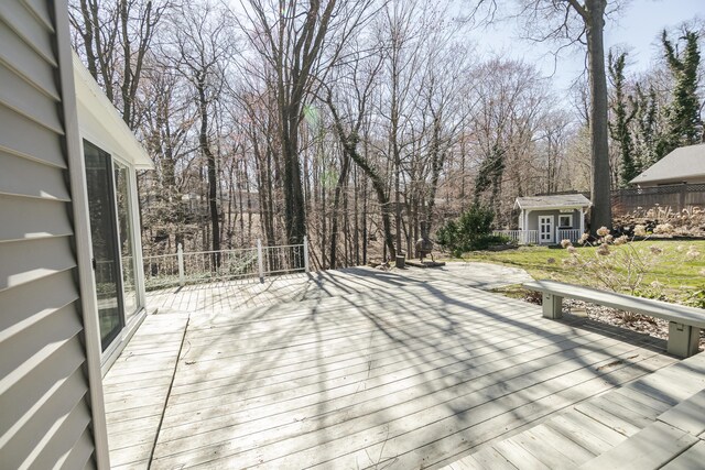 16230 Woodcrest Dr, Spring Lake, MI 49456 - deck featuring an outbuilding