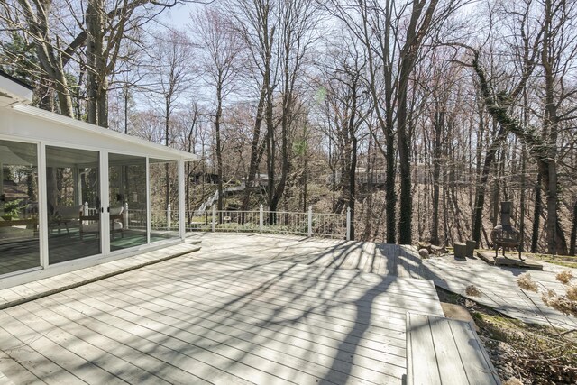 16230 Woodcrest Dr, Spring Lake, MI 49456 - wooden deck featuring a sunroom