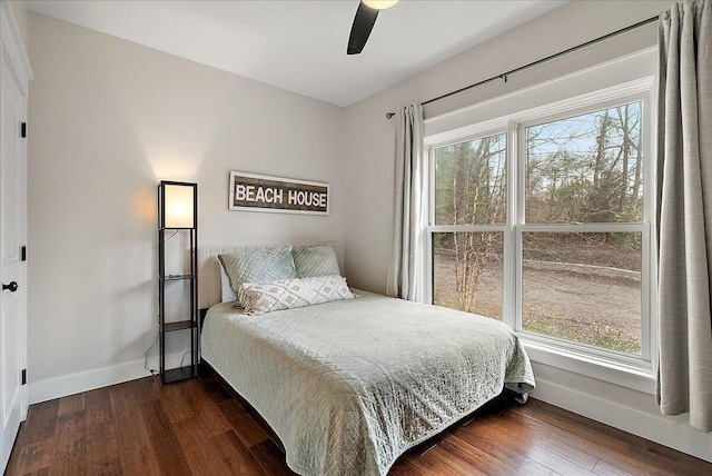 16325 Stones Throw Ln, Union Pier, MI 49129 - bedroom featuring baseboards, multiple windows, and dark wood-style floors