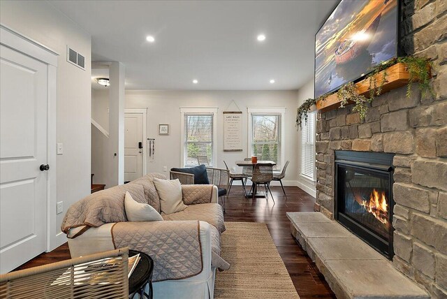 16325 Stones Throw Ln, Union Pier, MI 49129 - living area featuring recessed lighting, a stone fireplace, visible vents, baseboards, and dark wood-style flooring