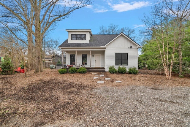 16325 Stones Throw Ln, Union Pier, MI 49129 - bungalow with a shingled roof and covered porch