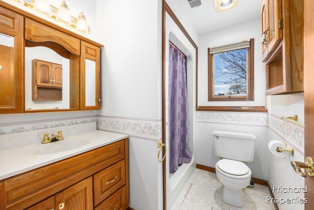 full bathroom with tile patterned floors, a shower with curtain, toilet, visible vents, and vanity
