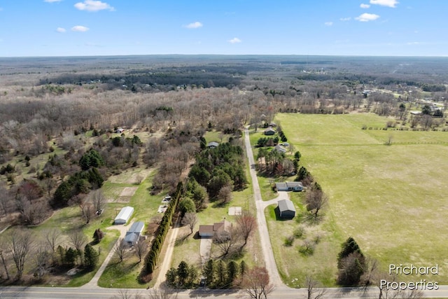 drone / aerial view with a rural view and a view of trees