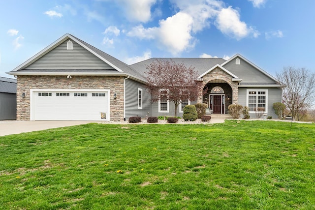 craftsman house with driveway, a front yard, an attached garage, and stone siding